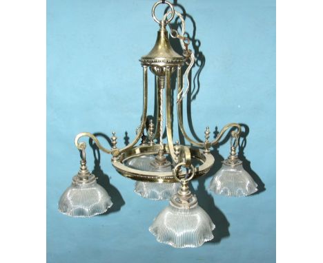 A late-19th/early-20th century brass five-light institutional hanging light fitting, with five ribbed and shaped glass shades