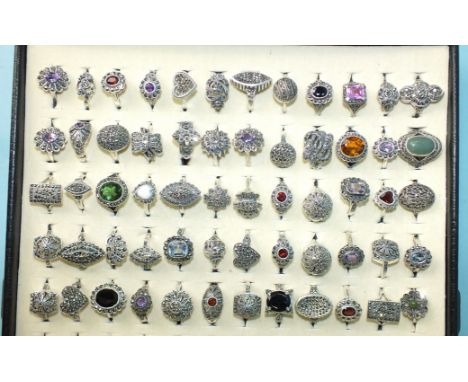 Sixty silver rings set marcasite, some set coloured stones and pastes, all marked 'Silver', 273g, sizes K-N. 