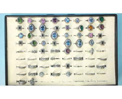 Sixty-six silver rings set marcasite, some set coloured stones and pastes, all marked 'Silver', 259g, sizes K-Q. 