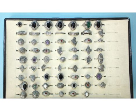 Sixty-two silver rings set marcasite, some set coloured stones and pastes, all marked 'Silver', 282g, sizes K-R. 