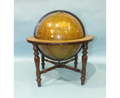 A Manning's table-top terrestrial globe of 12'' diameter, within bronze brass meridian ring, the horizon ring with calendar a