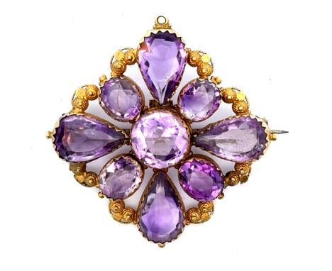 A Victorian quatrefoil amethyst brooch, (could be re converted to pendant by attaching a bale to existing fixing) Nine amethy