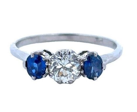 A three stone diamond and sapphire ring. Central diamond 5mm, 0.5ct approx  with a sapphire on either side.  Shank stamped '1