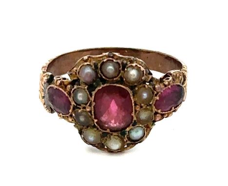 Georgian garnet and split pearl ring with garnet shoulders. Rose toned metal shank. See photos for condition. Size P.Please s