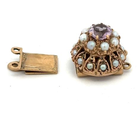 A vintage amethyst and seed pearl clasp, stamped 9ct. 5.01g. Good condition, signs of wear commensurate with age. Please see 