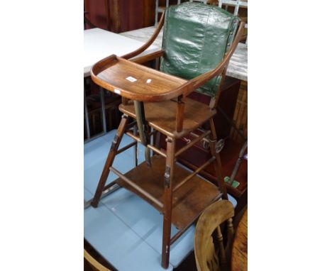 A Vintage child's folding highchair 