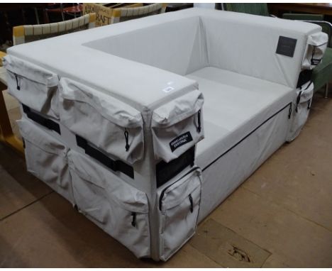 A Quinze &amp; Milan's Eastpak limited edition sofa "built to resist", with maker's labels and metal plaque 