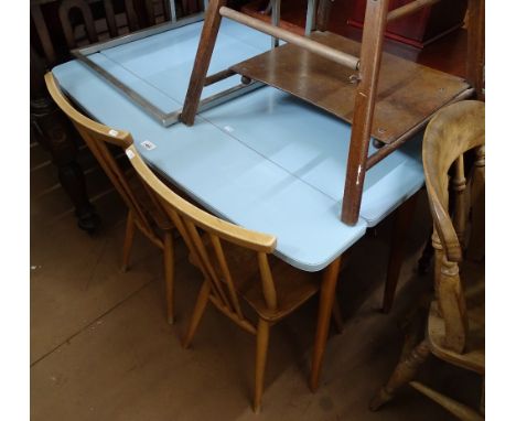 A mid-century blue laminated drop leaf kitchen table, together with a pair of Ercol elm-seated stick-back kitchen chairs 