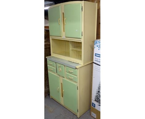 A Vintage green and cream painted maid saver cabinet, with fitted drawers and cupboards, W84cm, H180cm