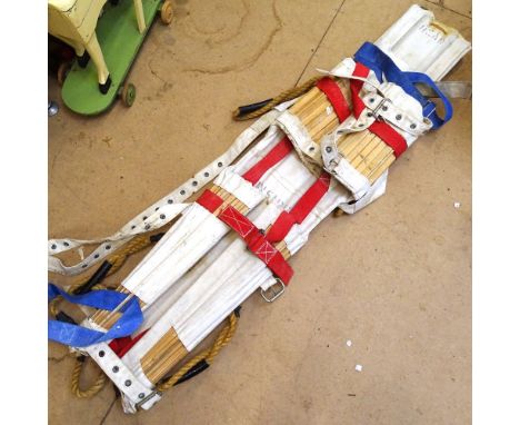 A Vintage canvas and wood stretcher 