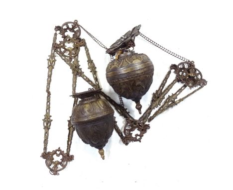 2 Continental embossed brass hanging light fittings 