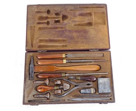 Specialist mahogany-cased set of tools, including hammer, files, punches, agate burnisher etc, case length 24cm 