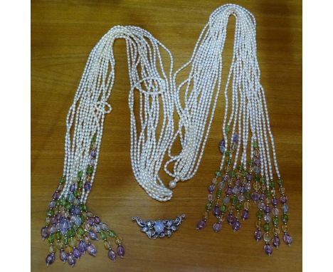 A silver marcasite and opal set brooch, pearl brooch, and a pearl and and stone set multi-strand necklace 