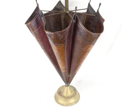 An umbrella design embossed copper stick stand 