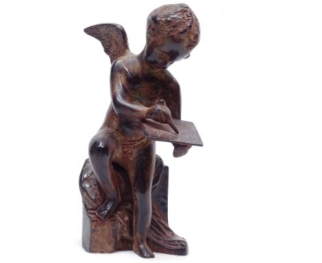 A Vintage patinated spelter Cupid figure, height 20.5cm 