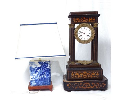 A French pillar clock with inlaid decoration, 48cm, and an Oriental table lamp 