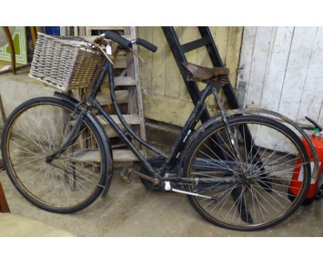 A Vintage butcher's/baker's bicycle with basket 