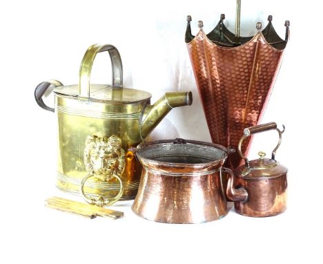 An umbrella style copper stick stand, a brass hot water can, folding rules etc 