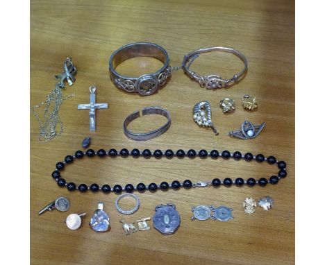 A box containing a Victorian bangle, locket, and costume jewellery 