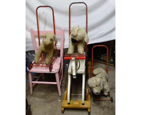 3 Vintage push-along dogs, and a small Vintage painted rocking horse 