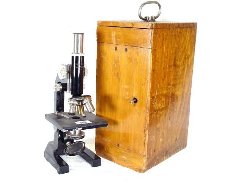 Vintage student's microscope with accessories and carrying case 