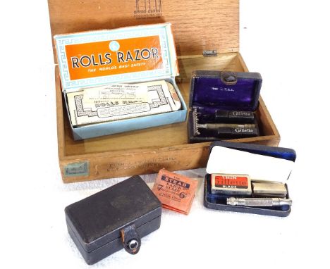 A cigar box, with 4 Vintage razors 