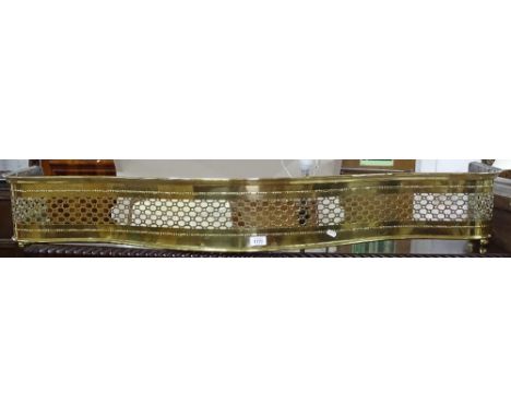 A Victorian serpentine-shape pierced brass fender, L127cm, H22cm, D36cm approx, internal width 122cm 