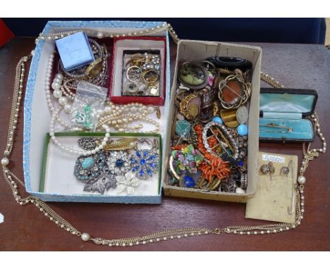 2 boxes of Vintage costume jewellery 