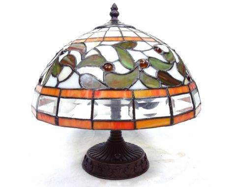 A wooden table lamp with Tiffany style leadlight shade, diameter 29cm 