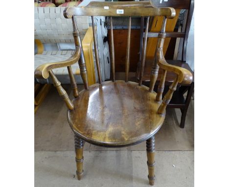 A Victorian Windsor stick-back kitchen chair, on turned legs 