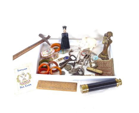 A telescope, ruler, ivory elephant, door knocker etc 