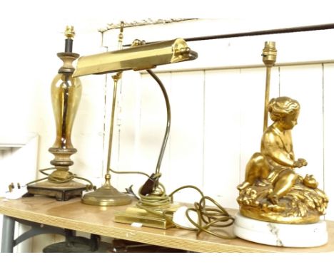 A gilt cherub design table lamp, 42cm, an adjustable desk lamp, and 2 others 