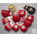 Pair of red Lonsdale autographed boxing gloves.