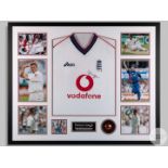 A white Asics Darren Gough England replica cricket shirt and ball