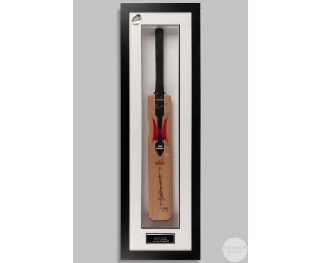 A Woodworm Premier "Wand" cricket bat signed by Andrew Flintoff, autographed in black pen with a silver plaque denoting that 