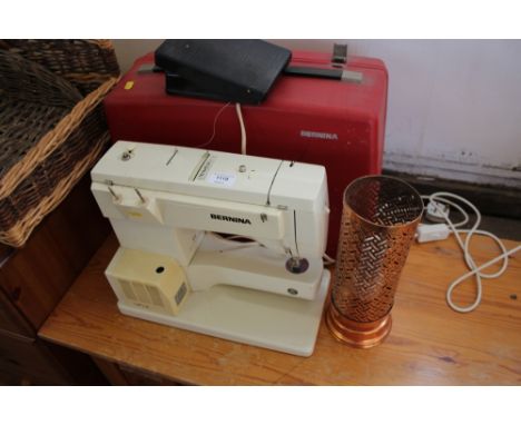 A copper table lamp together with a Bernina sewing machine (sold as collectors item)