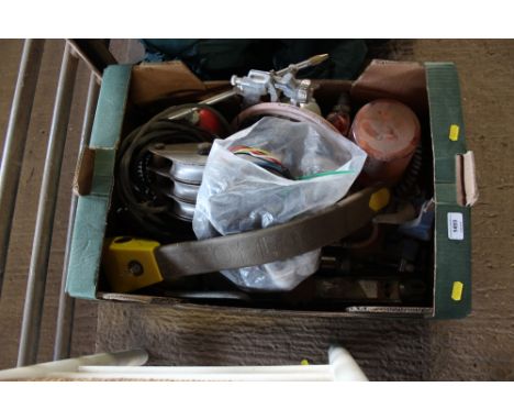 A box of various pulleys; spray guns; magnetic light etc
