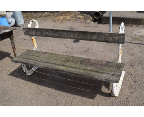 An Edwardian cast iron snake end garden bench