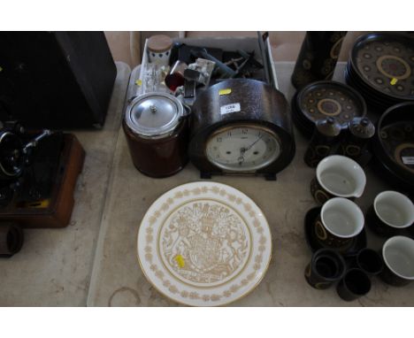 A box containing model planes; flat iron; flaring figures; Smiths two hole mantle clock and a Wedgwood commemorative plate
