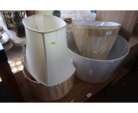 A quantity of various lamp shades