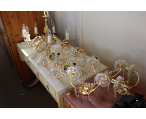 A seven branch chandelier together with a quantity of wall lights  
