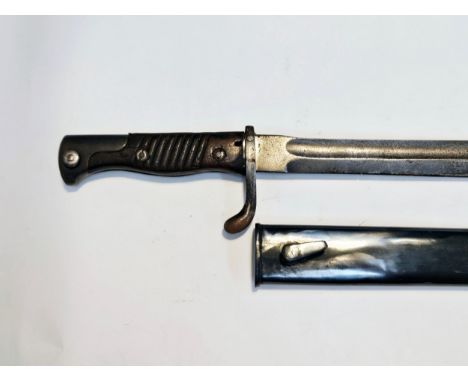 A WWI German Mauser bayonet by Deutsche Maschinenfabrik A-G Dutsburg, possible later scabbard