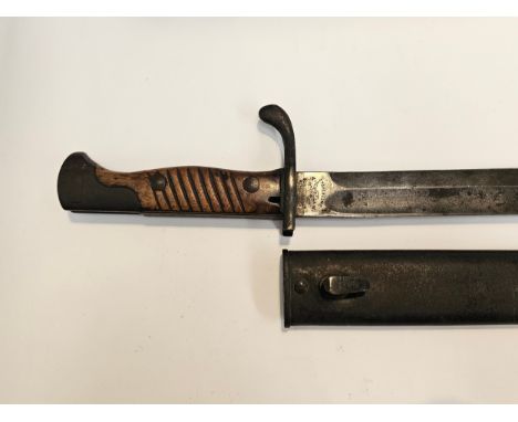 A WWI Imperial German Mauser bayonet, manufactured by Stahlblume A.W. Schulte & Co. Gevelsberg, blade length 36cm, overall le