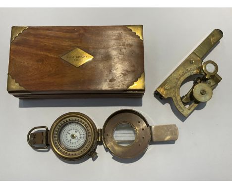 A reproduction WWII style brass marching compass in the British pattern, together with a reproduction level clinometer with c