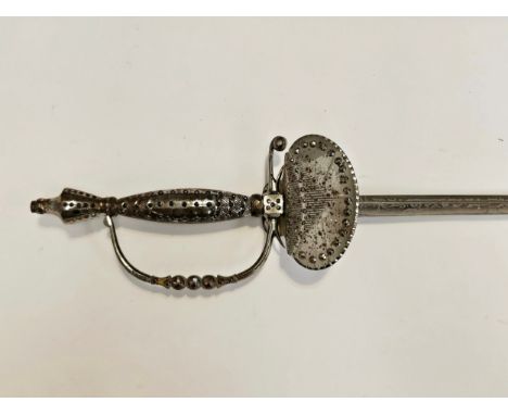 A cut steel court sword, the grip and guard with raised cut facets, rapier style blade inscribed Sandilands &amp; Son, with s