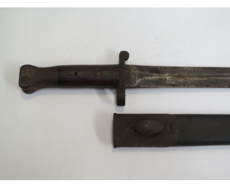 A British Pattern 1888 Mk. I second type bayonet, with steel-mounted leather scabbard, worn