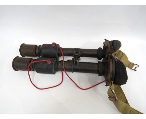 A pair of WWII British Army 'Tabby' infra-red night vision binoculars, the lens plate is stamped “Z.A,23001 AT 33”. Includes 