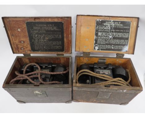 Two cased British Army field telephone sets