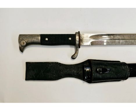 A WWII German K98 Police bayonet, the blade by Carl Eickhorn, Solingen, black grips, leather frog and blackened metal scabbar