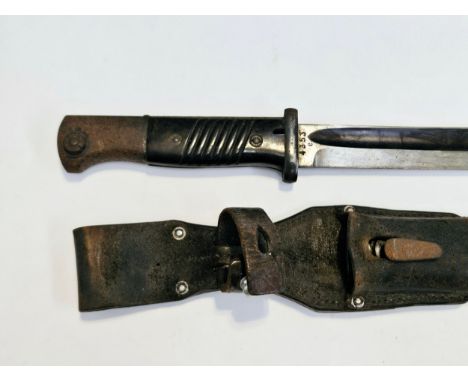 A WWII German Mauser K98 bayonet, dated '39, with matching serial no. 4353 to scabbard, Bakelite grips, with '38 dated frog